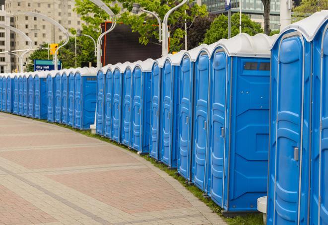 a row of portable restrooms set up for a large athletic event, allowing participants and spectators to easily take care of their needs in Beverly Hills, CA